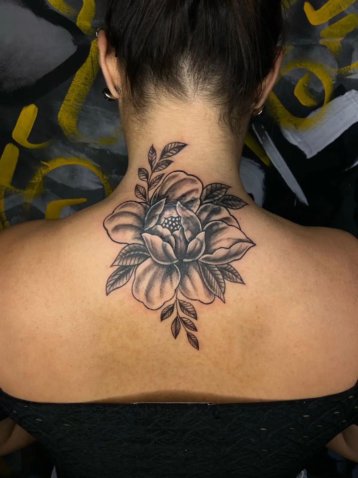 Tatuagem floral realizada por DG